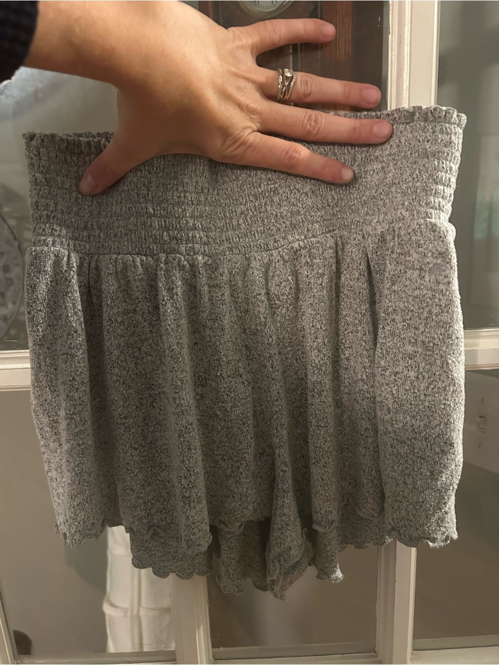 Out from under pajama shorts